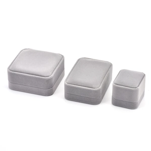 Three-piece set of grey velvet jewelry boxes for rings necklaces and bracelets