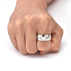 Detailed view of wide silver stainless steel ring with engraved Chinese scriptures