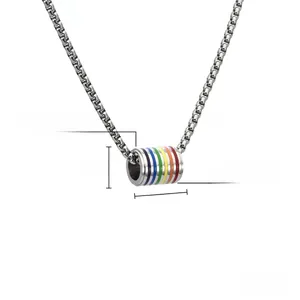 Macro detail of rainbow cylinder pendant in titanium steel, 12mm by 15mm for men