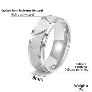Detail of 8mm silver titanium steel ring featuring diagonal cut and brushed texture