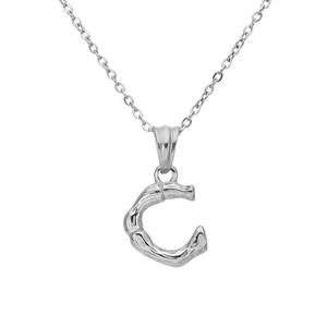 Macro view of silver bamboo texture letter C pendant necklace in minimalist titanium steel