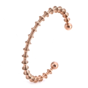 Spiral rose gold stainless steel cuff bracelet with round ball ends in a 45-degree view