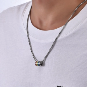 Male model wearing rainbow cylinder pendant necklace made of silver titanium steel