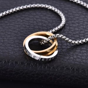 Dual interlocking rings necklace in gold and silver with Love Eternal engraving
