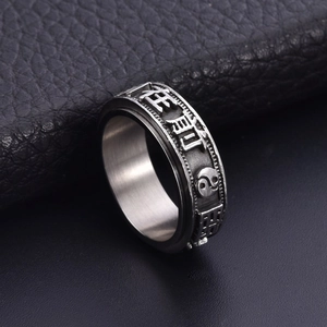 Vintage stainless steel spinning ring with rotating Tai Chi and Chinese script