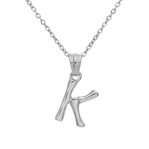 Macro shot of silver letter k pendant with unique bamboo texture on fine steel chain