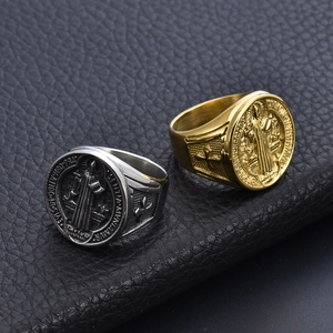 Gold and silver Saint Benedict medal rings in stainless steel with cross engravings