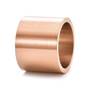 Close-up of wide rose gold titanium ring showing the brushed matte metal texture
