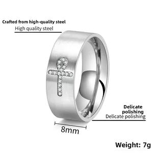 Macro detail of 8mm brushed titanium steel ring with sparkling Ankh cross zircon inlay