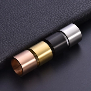 Wide brushed titanium steel ring set in 18K gold, rose gold, silver and black finishes