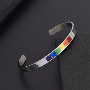 Polished silver stainless steel C-shaped cuff bracelet with vibrant rainbow enamel stripes