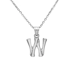 Macro shot of silver bamboo-textured letter W pendant necklace on a fine link chain