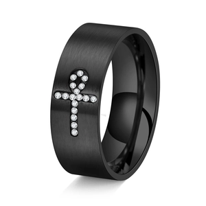 Detailed macro view of 8mm black brushed titanium ring with inlaid zircon cross pattern