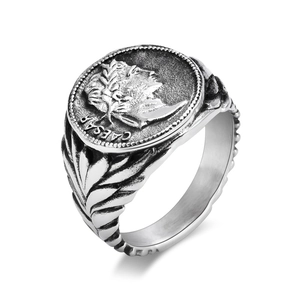 Macro view of Caesar Roman coin relief and laurel leaf pattern on titanium steel ring