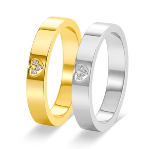 Minimalist 18K gold and silver heart rings with micro-set diamonds for couples