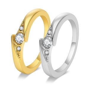 Polished stainless steel bypass ring set with round cubic zirconia in gold and silver