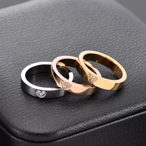 Minimalist 18K gold-plated heart-shaped diamond-set rings set in three metallic tones