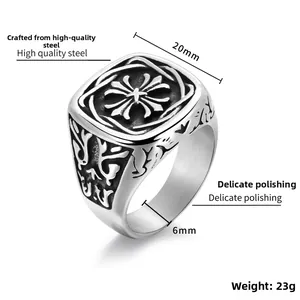 Detail of vintage steel cross ring with dimension specs and gothic engraving