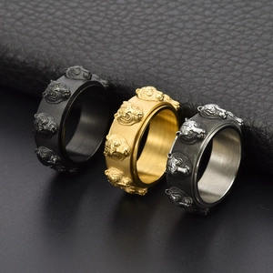 Three-piece tiger relief spinning rings in black, gold, and silver finishes for men