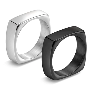 Detail of 6mm square rings in silver and black finish made of premium titanium steel