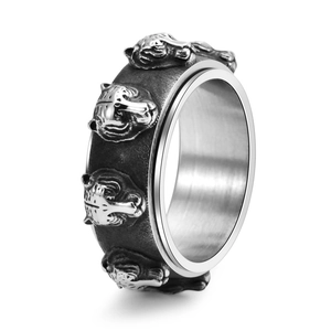 Detailed relief of vintage tiger head on stainless steel spinner ring with punk finish