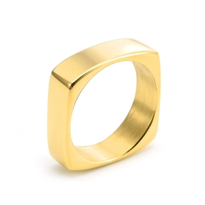 Close-up of a 6mm wide square gold ring with polished finish and minimalist geometry