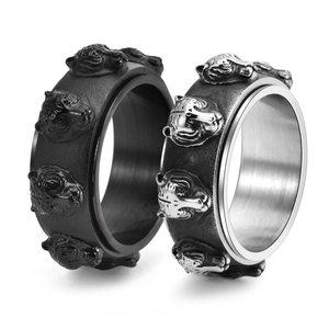Vintage stainless steel spinning tiger head rings in matte black and silver finish