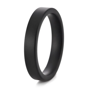 Minimalist black ceramic ring with a matte sandblast finish for men and women