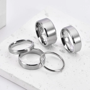 Minimalist brushed titanium steel rings set with diagonal edges in silver finish
