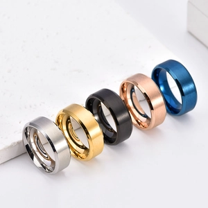 Detailed view of matte brushed titanium steel rings in five colors with polished edges