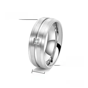 Close-up of 8mm titanium steel ring with brushed finish and square zircon inlay