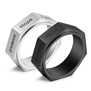 Brushed titanium steel heptagon spinner rings in black and silver featuring engraved virtues
