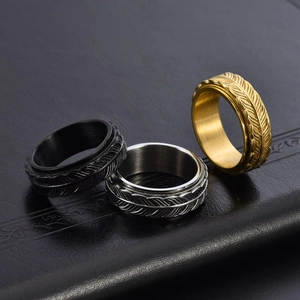 Retro titanium steel rotating fish tail rings for men in black, silver, and gold finish