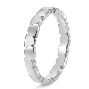 Macro side view of silver polished band ring featuring interlocking small heart patterns
