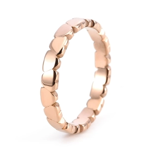 Detail of rose gold plated heart link ring showing intricate heart pattern structure