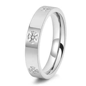 Polished silver ring featuring cross pattern relief and sparkling zircon inlay