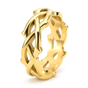 Close-up of golden thorn vine woven ring showing polished hollow design details