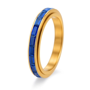 Detailed side view of 18K gold band ring with channel set rectangular blue zircons