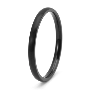 Detail of matte brushed black titanium steel ring with polished inner surface