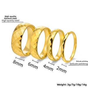 Golden tungsten ring set showing 2mm to 8mm width options with diamond cut texture