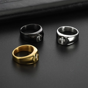 Three-piece set of stainless steel cross signet rings in gold, silver, and black finish