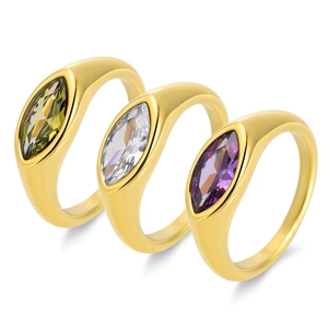 Detailed close-up of three 18K gold rings featuring marquise-cut green, white, and purple stones