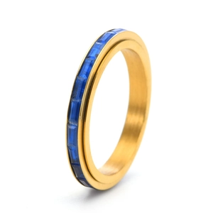 Macro view of 18K gold eternity band with rectangular blue zircon channel setting