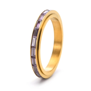 Detail view of 18K gold plated steel ring featuring a row of channel-set purple zircons