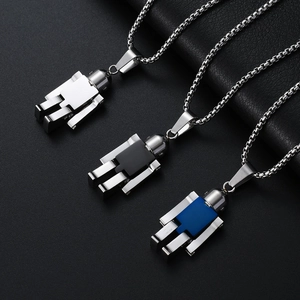 Detail view of movable robot pendants in silver, black and blue finishes with box chain