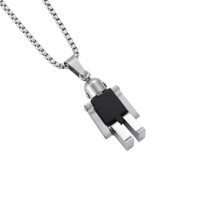 Macro shot of a stainless steel robot pendant with black inlay on a silver box chain