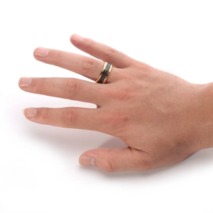 8mm men's gold stainless steel ring featuring black carbon fiber inlay and a smooth finish
