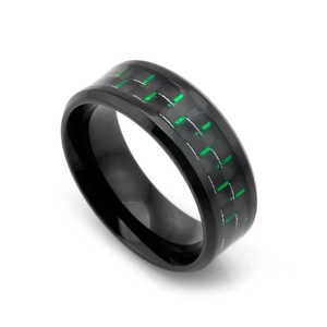 Close-up of titanium steel ring with green carbon fiber inlay and polished black edges