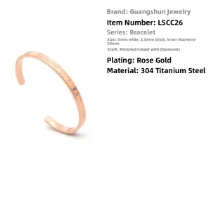 Detailed macro view of rose gold C-shaped cuff bracelet with Forever Love engraving