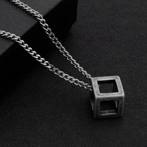 Retro hollow cube pendant with curb chain in antique silver titanium steel